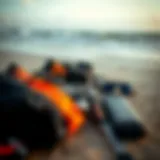 Kite surfing gear laid out on the beach