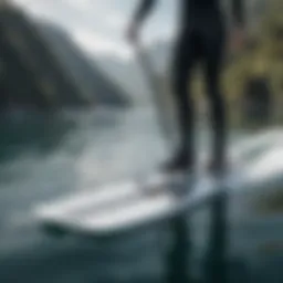 A sleek e foil board gliding effortlessly over the water surface