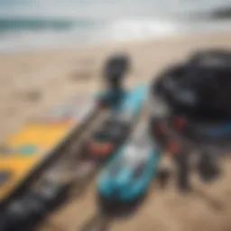 Essential kiteboarding equipment laid out on the beach