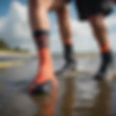 Person caring for neoprene socks after a kiteboarding session