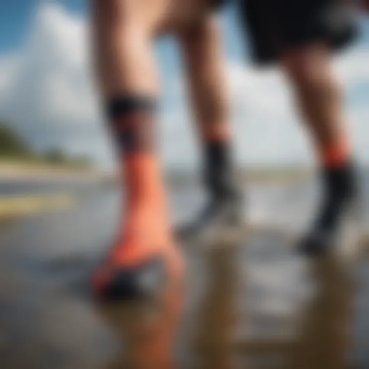 Person caring for neoprene socks after a kiteboarding session