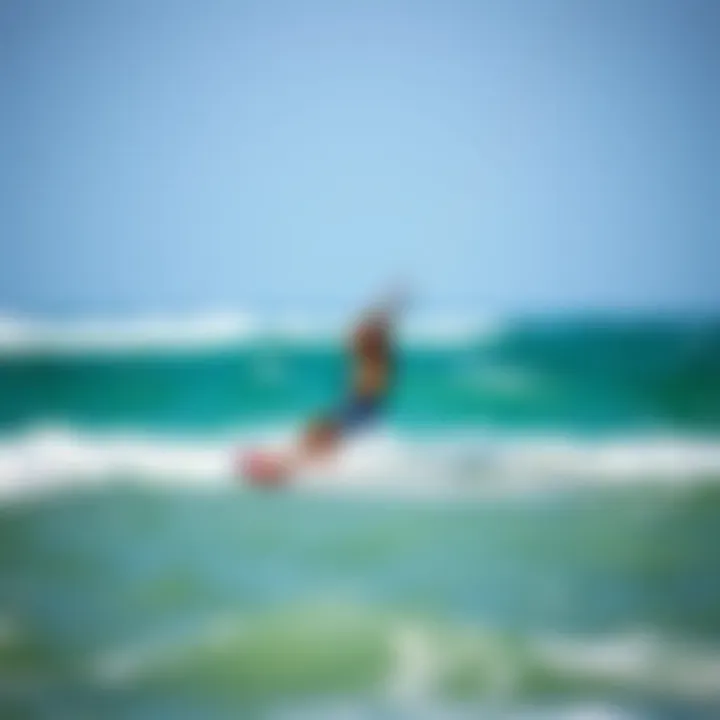 Kiteboarding Enthusiast on the Waves A kiteboarding enthusiast navigating the ocean waves with a duotone kite