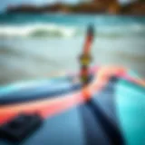 Close-up view of a Liquid Force kite board showcasing its sleek design and vibrant colors.