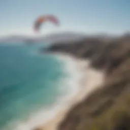 A vibrant kite soaring high above the stunning Baja coastline