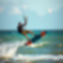 A kiteboarder soaring over the waves