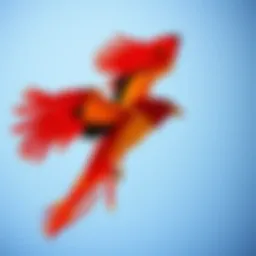 Vibrant phoenix kite soaring against a clear sky