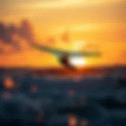 A wing surfer gliding over the waves during sunset