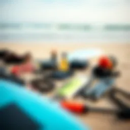 Essential surf kit components laid out on a beach