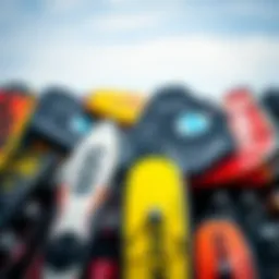 Diverse collection of used kiteboarding gear showcasing various brands and styles.