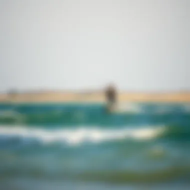 Joyful Kiteboarding Experience at the Beach A serene beach scene with a kiteboarder riding the waves, symbolizing the joy of kiteboarding.
