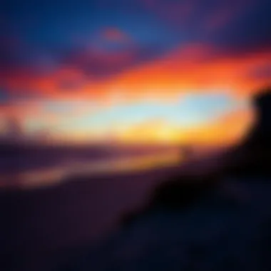 Vibrant Sunset Over Jensen Beach A vibrant sunset illuminating the sandy shores of Jensen Beach