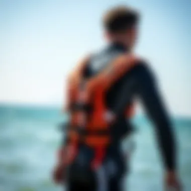 Ensuring the Right Fit for Safety Kiteboarder checking the fit of a Mustang Survival Suit