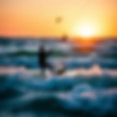 Kitesurfers enjoying the waves at sunset