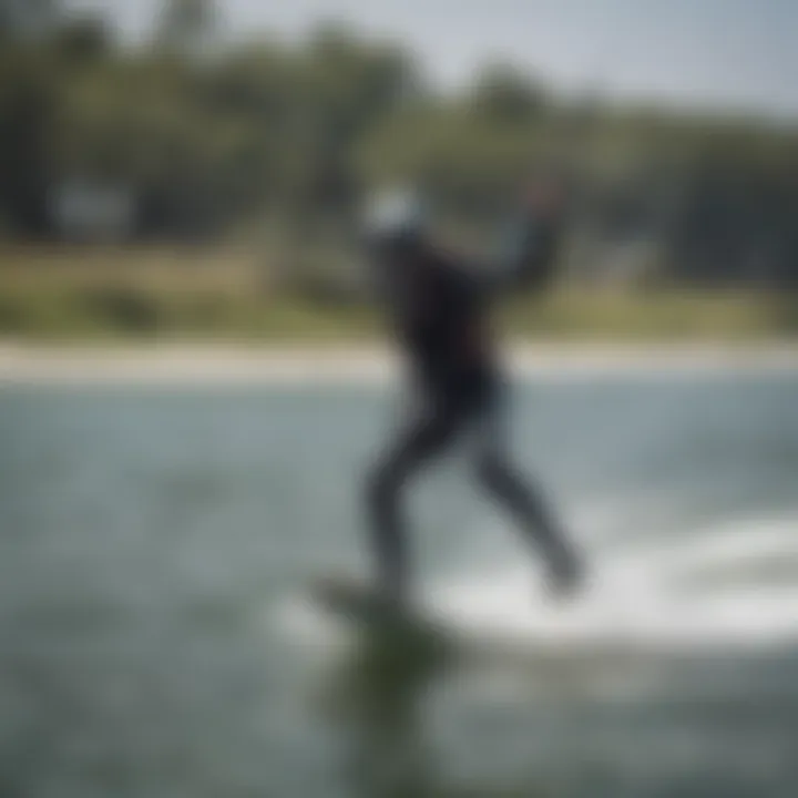 Kiteboarder demonstrating the use of the Mystic seat harness on water