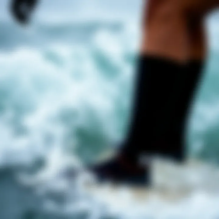 Surfing in Cold Water with Neoprene Socks Person wearing neoprene surf socks while surfing in cold water
