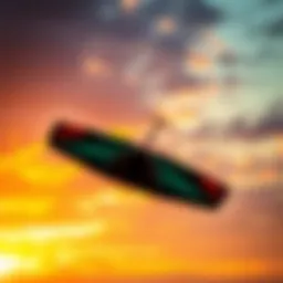 Dynamic view of the Switchblade 12M kite soaring against the backdrop of a vibrant sunset