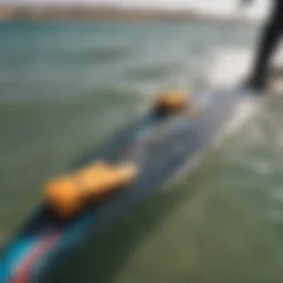 Close-up of a kiteboard with front traction pads