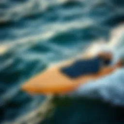 Cutting-edge powered foil surfboard gliding over ocean waves