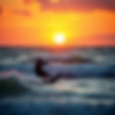 Kiteboarder navigating through waves at sunset