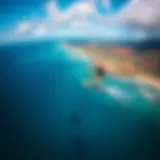 Kiteboarding over Oahu's vibrant coastline